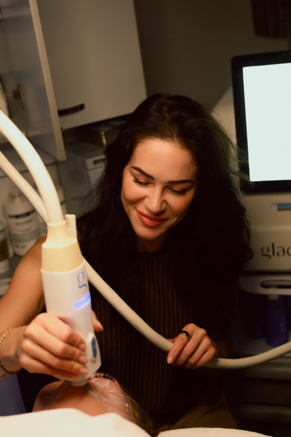 Kristen Kane performing a Glacial facial at Level Aesthetics