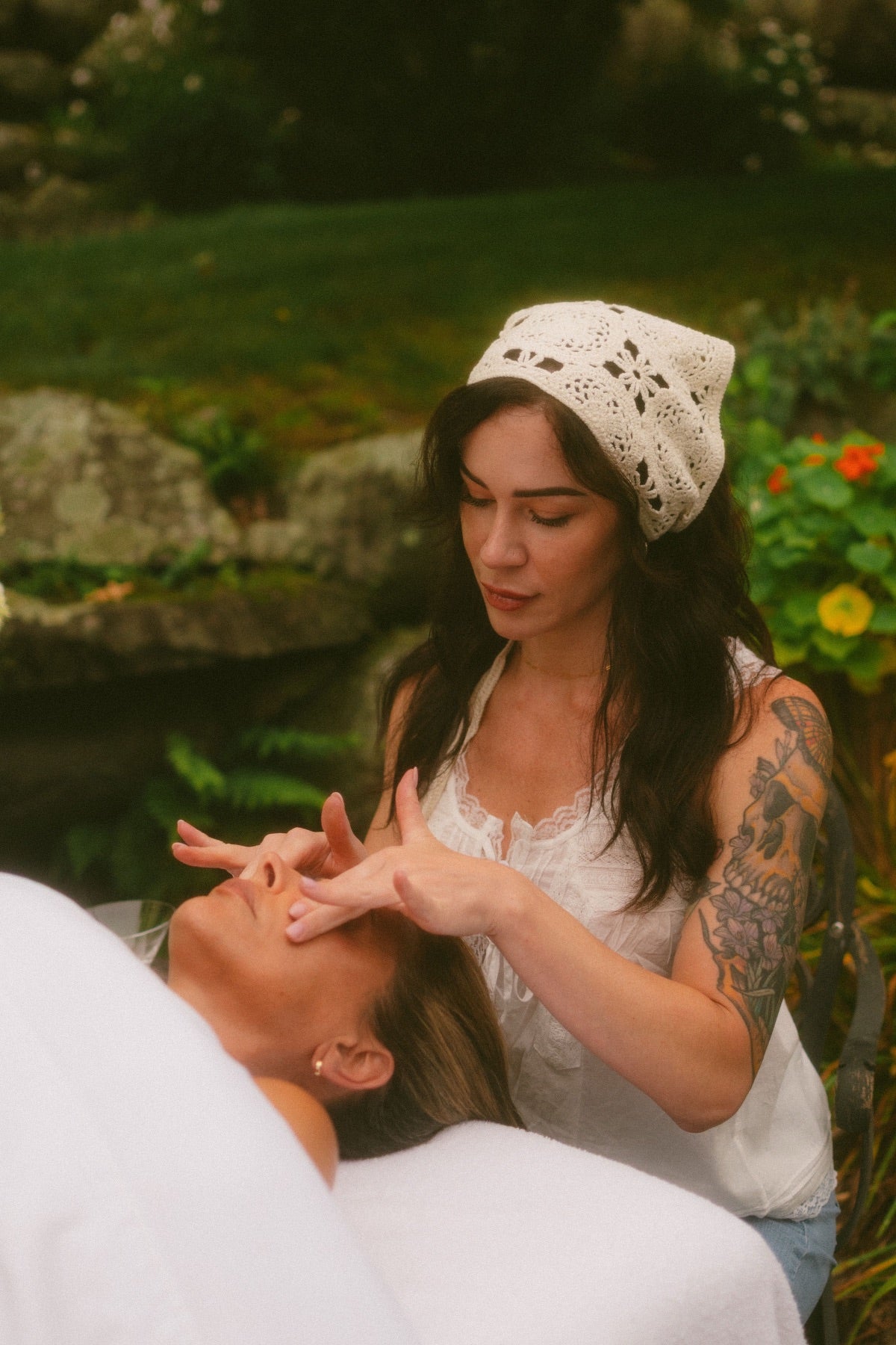 Kristen Kane giving a facial outdoors, Level Aesthetics, New Windsor NY