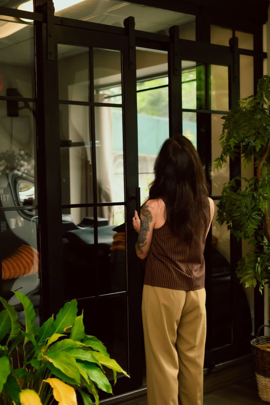 Kristen Kane at the entrance of the Level Aesthetics studio