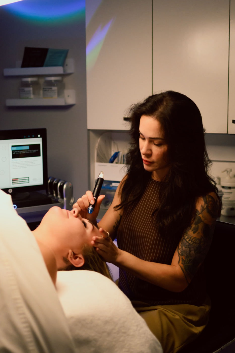 Kristen Kane performing a facial treatment at Level Aesthetics in New Windsor, NY